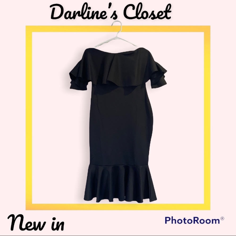 Black mermaid off shoulders dress.